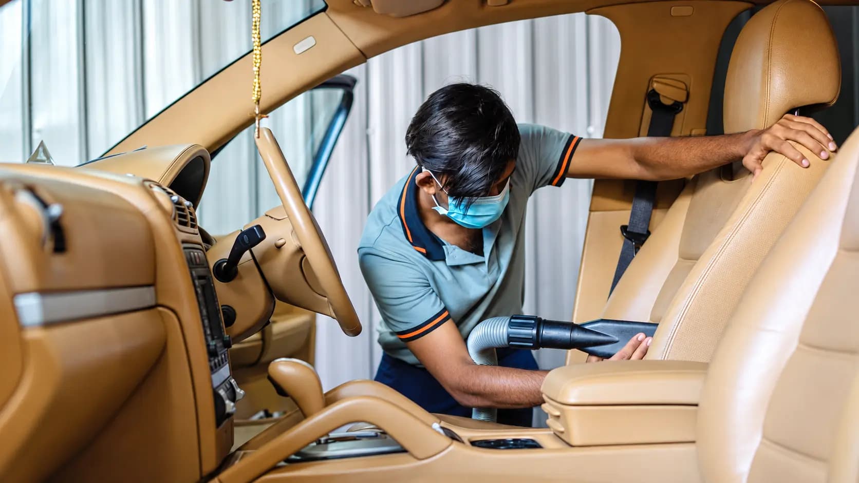 Vacuuming a vehicle interior
